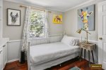 First bedroom presents a twin-trundle bed, perfect for kids -second floor-
